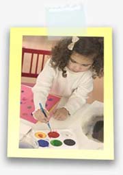 photo of child painting