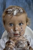 child eating cake